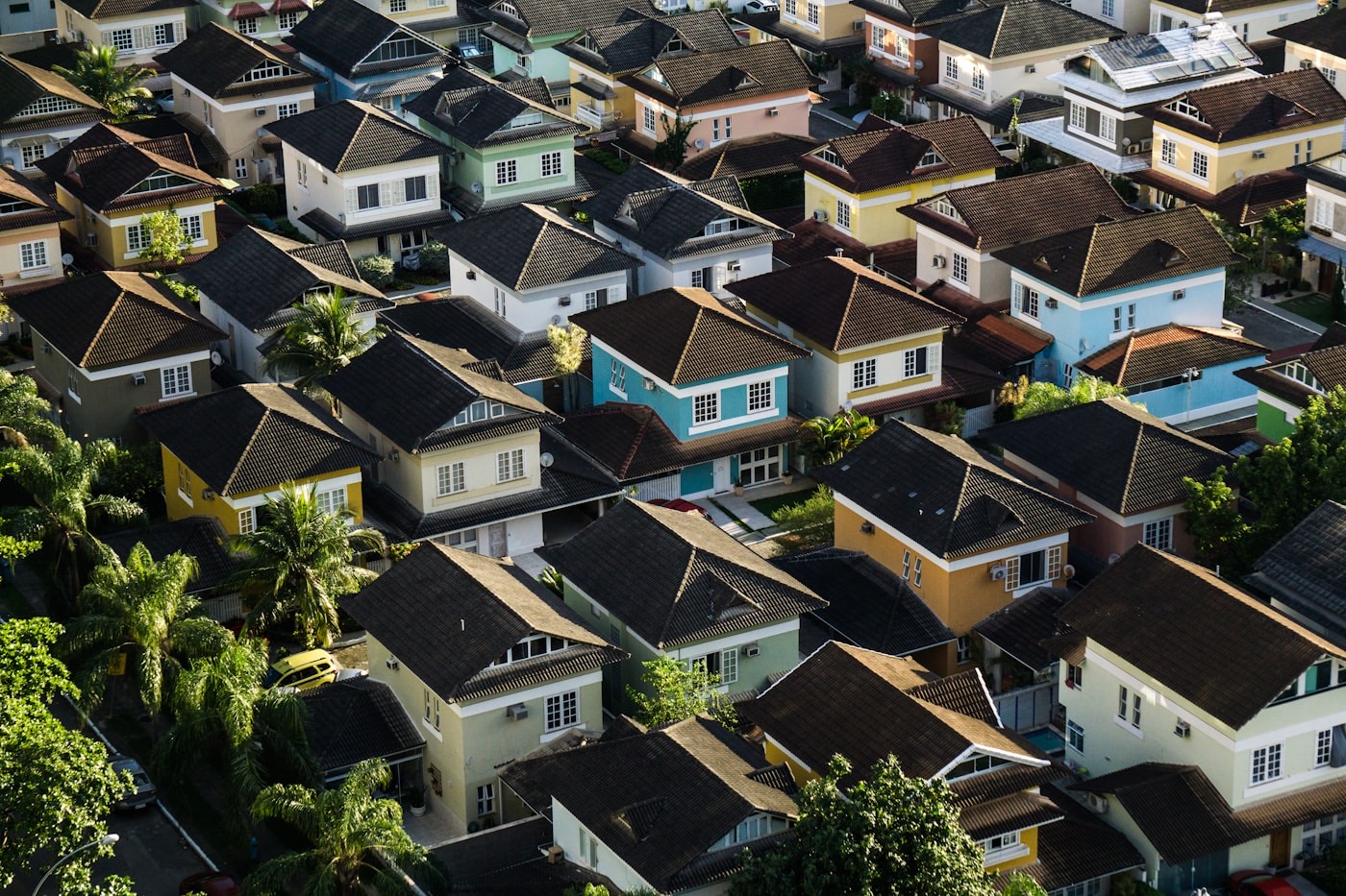 Hayward neighborhood rooftops from above — fog-belt homes from Cherryland to the Hayward Hills