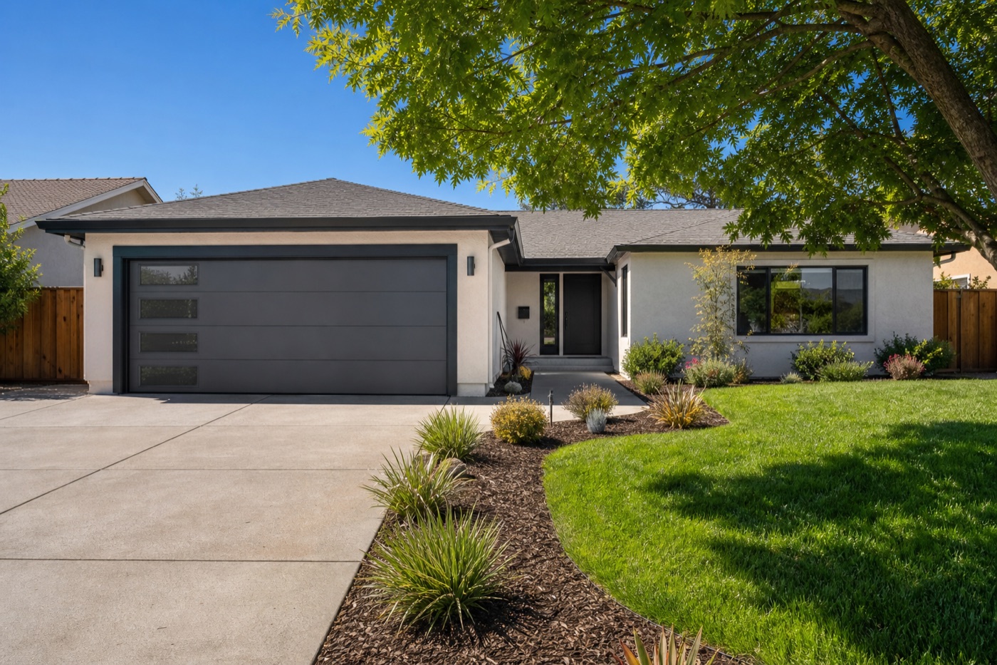 Modern replacement garage door on an East Bay home: an upgrade from a worn, dated door
